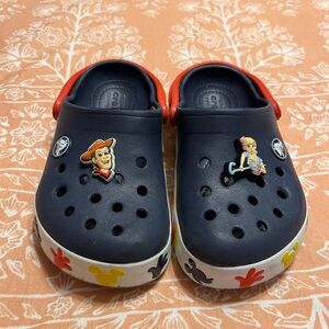 CROCS Blue and Red Sandals with Decorative Charms